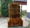 Art deco walnut display cabinet. Click here to view this piece...