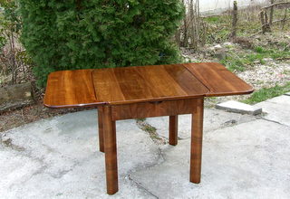 Extendable art deco dining table. Click here for more details.